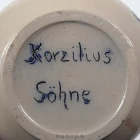 korzilius-soehne_schankkrug-blaumalerei-sonnenrad-geritzt_0.8l_6-k